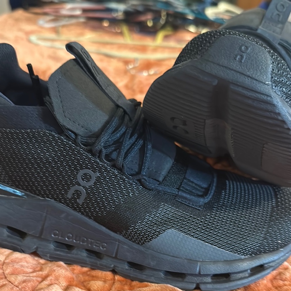 On Running Black Athletic Shoes with Breathable Mesh and Cushioned Midsole
